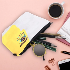 Detailed flat-lay of the evil eye makeup bag showing interior storage and capacity