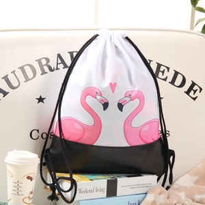 Drawstring backpack featuring pink flamingo print and durable black base for storage