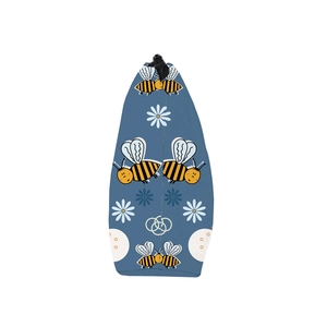Detail of waterproof blue travel pouch featuring cute bee and daisy floral patterns