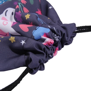 Detail of the navy drawstring bag showing the unicorn cartoon print and durable fabric texture
