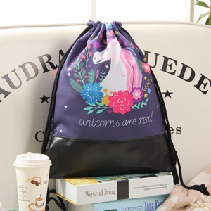 Drawstring gym bag with unicorn print and floral patterns on black leather base