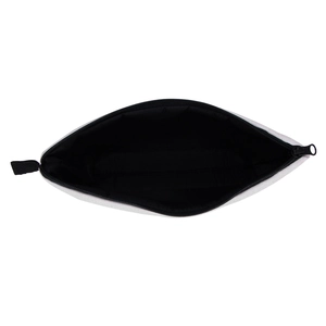 Overhead view of evil eye canvas makeup bag with black zipper and spacious black lining