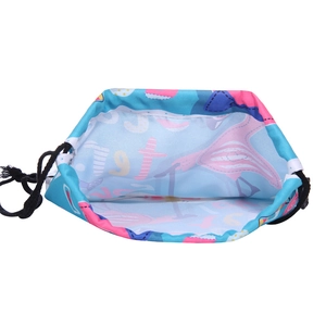 Detail view of bird print drawstring bag showing spacious interior and secure closure