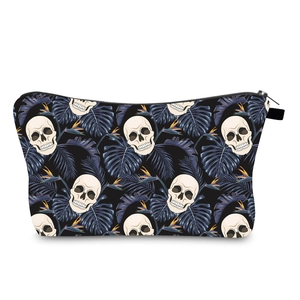 Detail of waterproof makeup bag with stylish skull and tropical plant print patterns