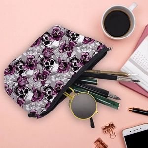 Cosmetic bag featuring gothic skull and purple tulip prints with black metal zipper