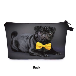 Detail view of the waterproof pug print makeup bag with yellow bow and zipper closure