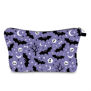 Detail view of Halloween makeup bag with purple digital print, bat pattern and zipper closure