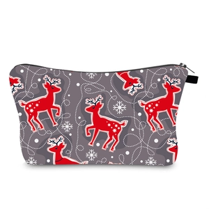 Detail view of the zipper closure on the waterproof Christmas reindeer makeup bag
