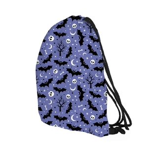 Detail of Halloween drawstring bag with purple print featuring bats and skull patterns