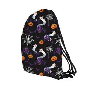 Close-up of Halloween drawstring bag with purple castle, orange pumpkin and ghost pattern