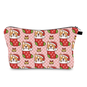 Detail of waterproof makeup bag with Christmas Corgi print and smooth zipper closure