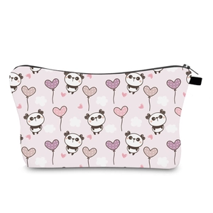 Detailed view of pink cosmetic bag with cartoon panda and heart balloon digital print