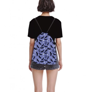 Purple Halloween drawstring backpack with skull and bat patterns shown on a female model