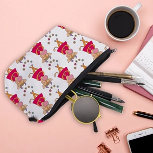 Waterproof toiletry bag with cute cartoon pig print on stylish desk with accessories