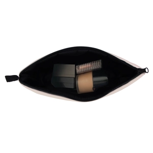 Spacious interior of waterproof makeup bag showing cosmetics storage and metal zipper