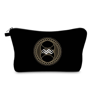 Detailed macro view of the water-resistant black toiletry bag with Aquarius print