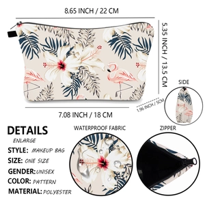 Waterproof travel cosmetic bag with tropical pink flamingo and floral print details