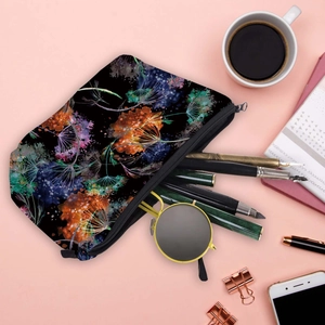 Waterproof travel cosmetic bag with colorful dandelion floral print on a black background
