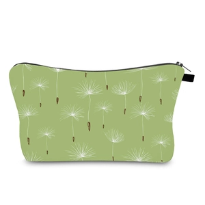 Detailed close-up of water-resistant green dandelion print travel makeup bag zipper