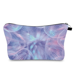 Detail of water-resistant cosmetic bag with purple dandelion digital print and black zipper