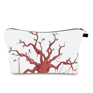 Close-up of tree of life print on water-resistant makeup bag with zipper detail