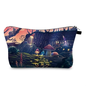 Close-up of the fantasy forest print featuring mushrooms and cats on the cosmetic bag