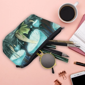 Colorful mushroom makeup bag with frog print on pink desk with lifestyle accessories
