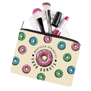 Square donut print makeup bag with whatever sprinkles your donuts slogan and brushes