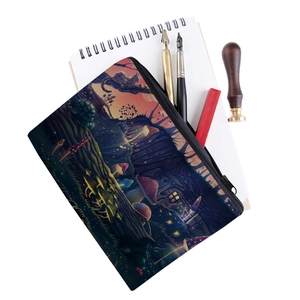 Close-up of square toiletry bag with colorful mushroom print and stationery accessories