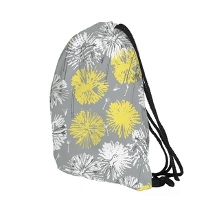 Detail of the durable drawstring closure and dandelion print on the grey canvas backpack
