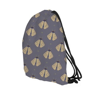 Close-up of drawstring backpack featuring digital firefly print and black woven cords