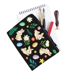Detail of bunny and floral print on black multi-functional makeup pouch for travel