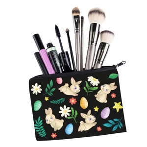 Macro view of bunny print cosmetic bag showing brushes, mascara, and makeup tools inside