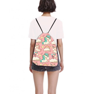 Pink drawstring backpack with unicorn print and rainbows for outdoor travel