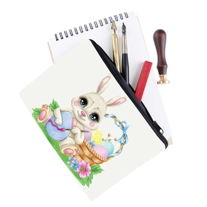 Close-up of rabbit print makeup bag with vintage floral bunny illustration and zipper