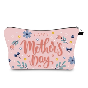 Close-up of pink Mother's Day makeup bag with floral print and black metal zipper detail