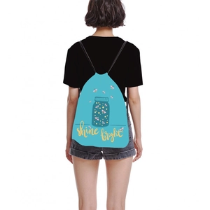 Light blue drawstring backpack with firefly print and Shine Bright slogan for travel