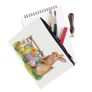 Detail view of rabbit print makeup bag showing stationery storage and smooth zipper closure