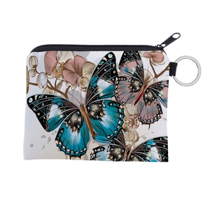 Detail of colorful butterfly canvas coin purse with orchid pattern and silver keychain ring