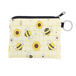 Detail of honey bee and sunflower print coin purse with metal zipper and keychain ring