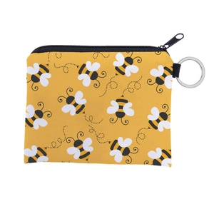 Detail of waterproof coin purse with cute bee pattern, black zipper and metal keyring