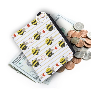 Waterproof bee print coin purse with stripe pattern, shown with dollar bills and coins