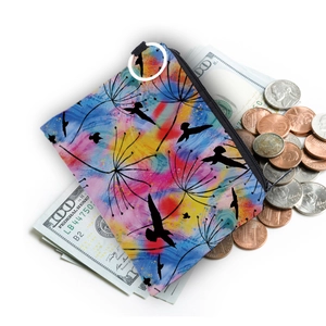 Waterproof dandelion print coin purse with hummingbird design shown with dollar bills and coins