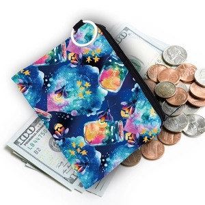 Water-resistant firefly print coin purse with a durable metal zipper and starry art design