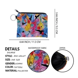 Close-up of waterproof polyester coin purse with dandelion print and metal key ring