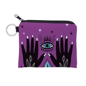 Detail view of purple canvas coin purse with evil eye palm print and metal ring zipper
