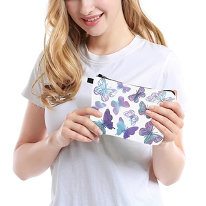 Trousse de maquillage blanche avec imprimé papillon et fermeture éclair noire