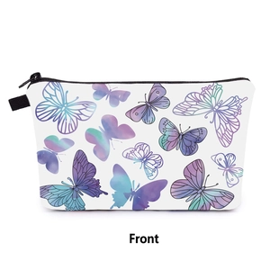 Détail de la trousse de maquillage voyage avec motifs papillons et fermeture éclair noire
