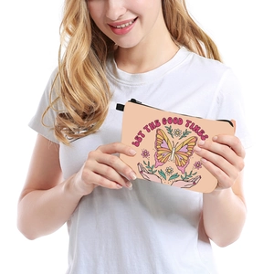 Portable cream makeup bag with vintage butterfly print and Let the Good Times text