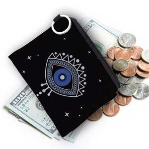 Black Evil Eye square coin purse with zipper and metal ring on white background with cash